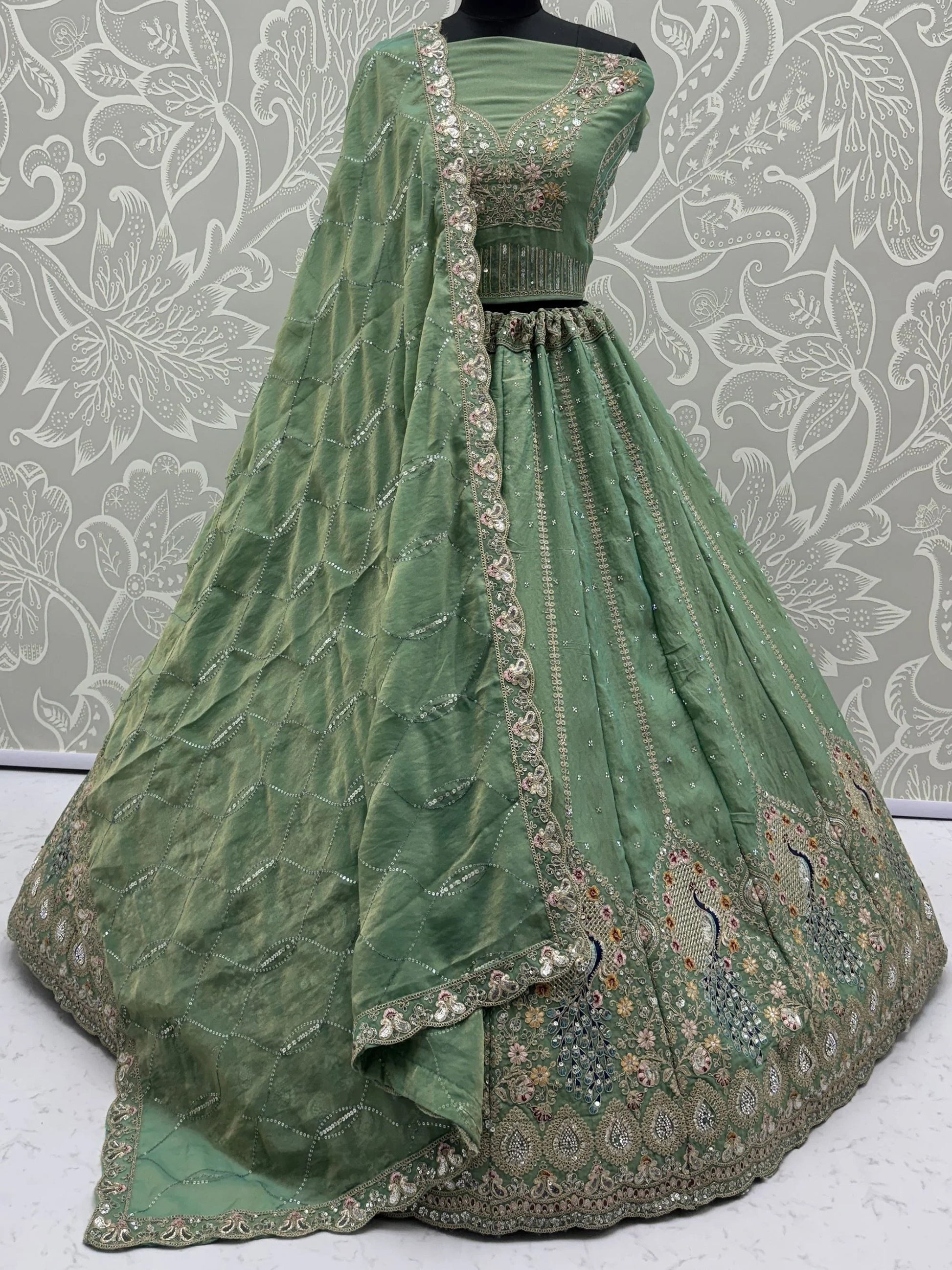 Regal Green Zircon Work Silk Mehendi Wear Lehenga Choli With Dupatta