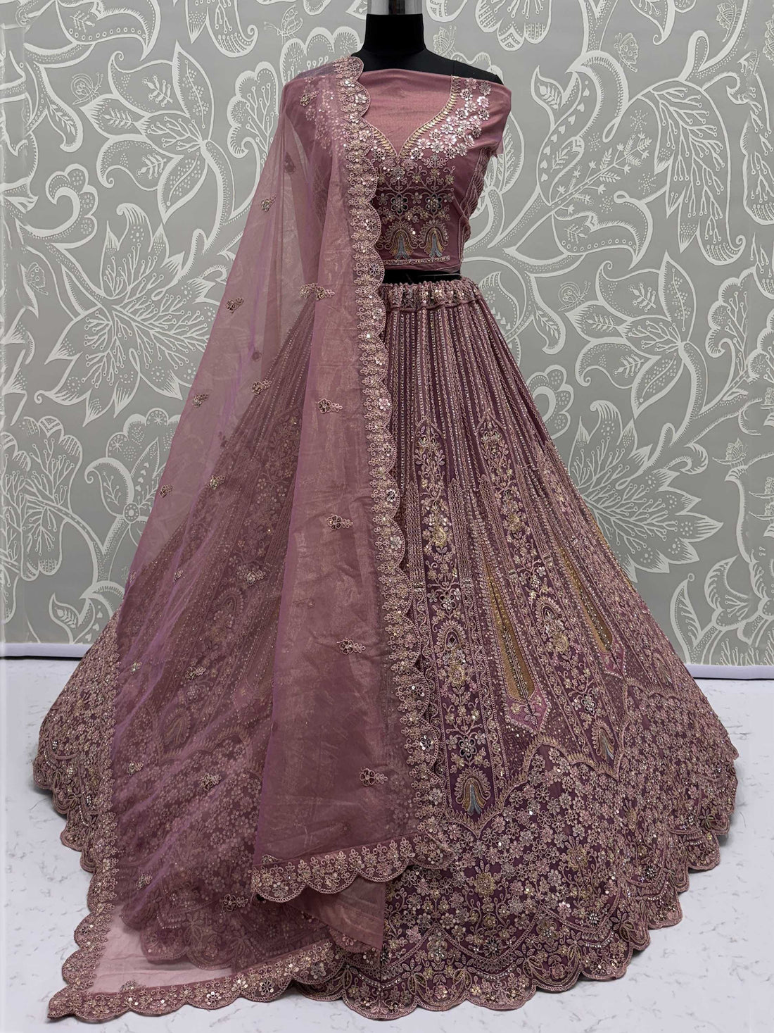 Regal Mauve Thread Embroidery Net Engagement Wear Lehenga Choli
