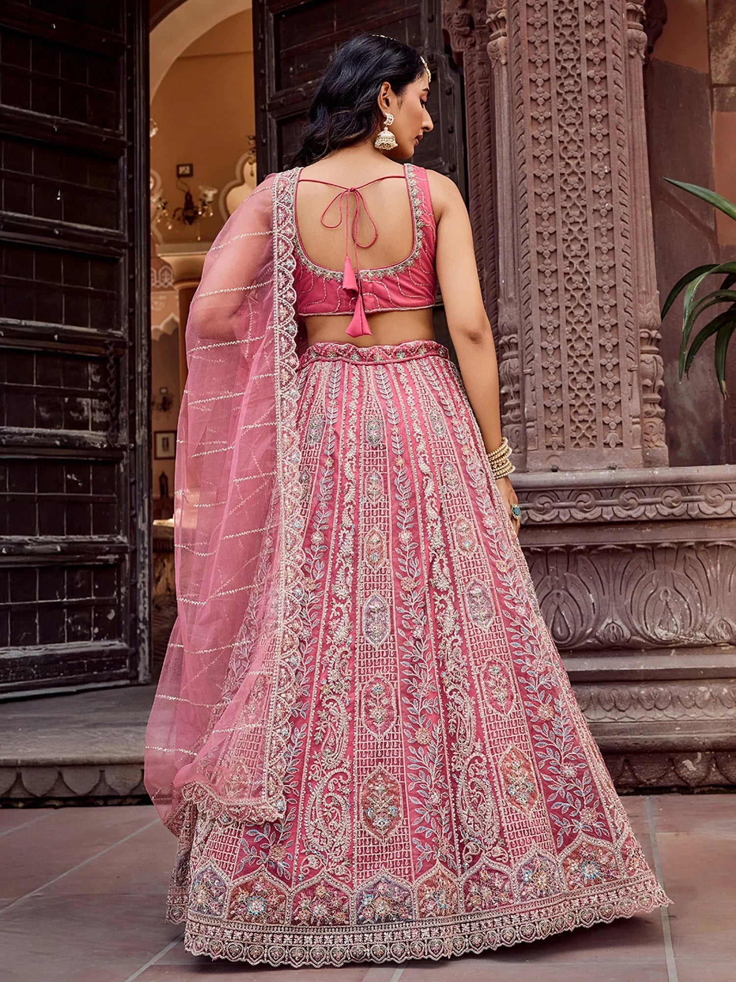 Regal Rose Gold Net Embroidered Engagement Wear Lehenga Choli With Dupatta