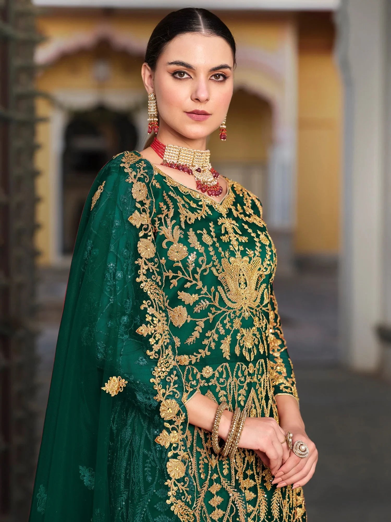 Remarkable Green Stone Work Net Mehendi Wear Gown With Dupatta