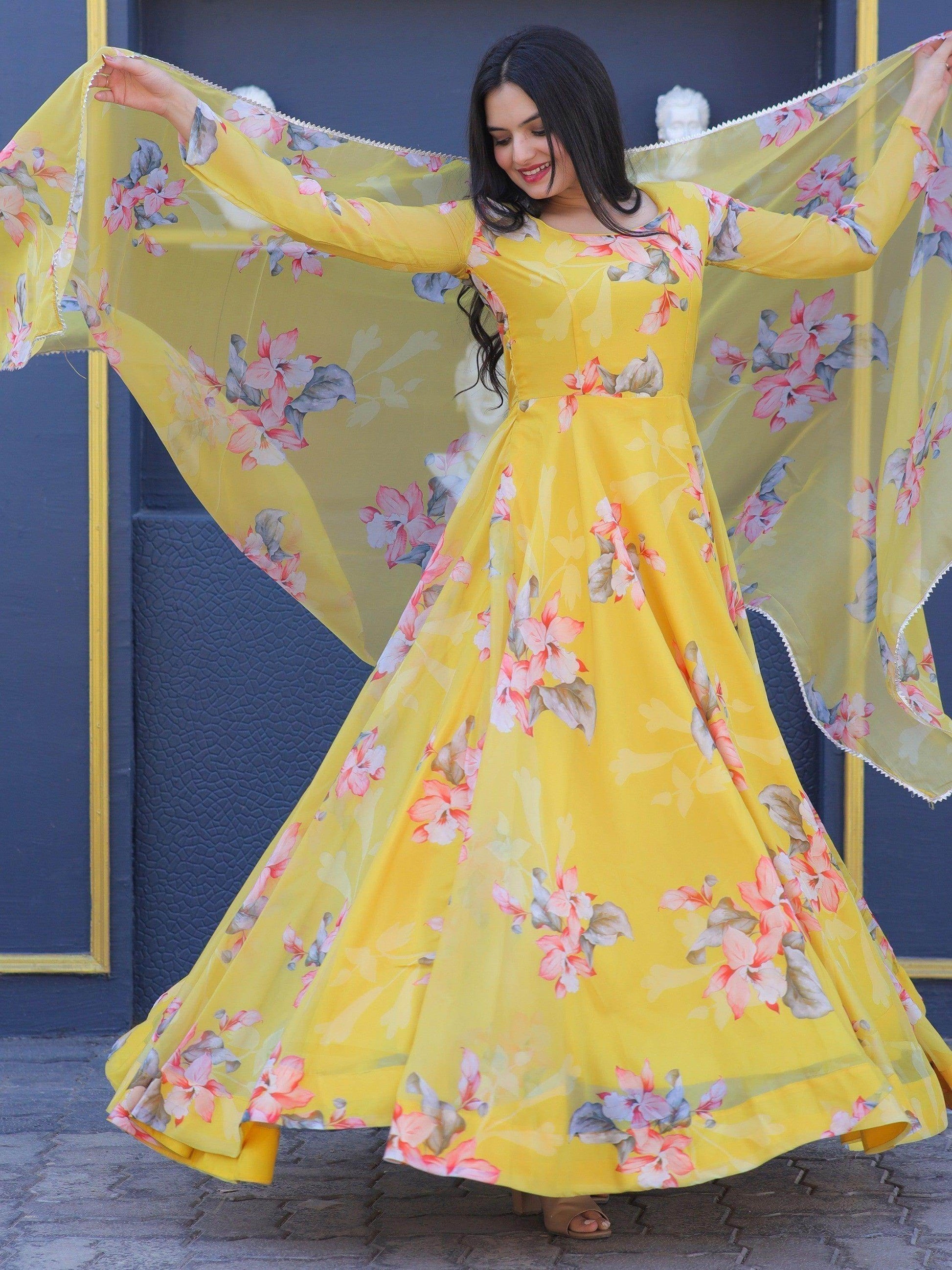 Remarkable Yellow Floral Printed Silk Traditional Gown With Dupatta - Zeel Clothing