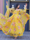 Remarkable Yellow Floral Printed Silk Traditional Gown With Dupatta - Zeel Clothing