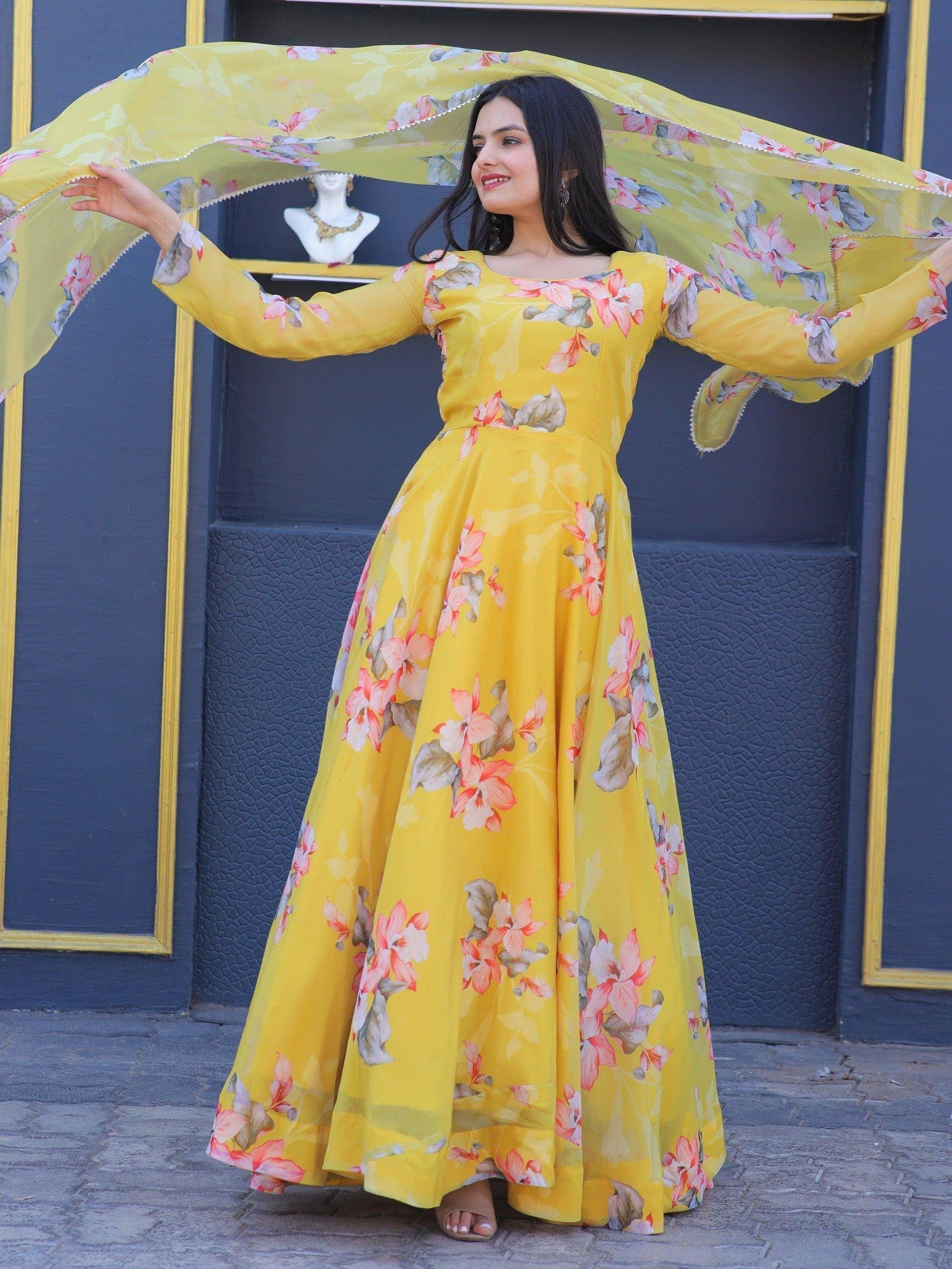 Remarkable Yellow Floral Printed Silk Traditional Gown With Dupatta - Zeel Clothing