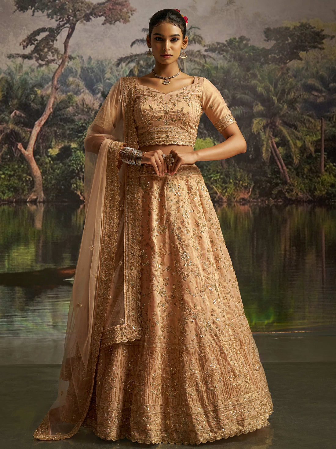 Rich Peach Dori Embroidery Net Sangeet Wear Lehenga Choli With Dupatta
