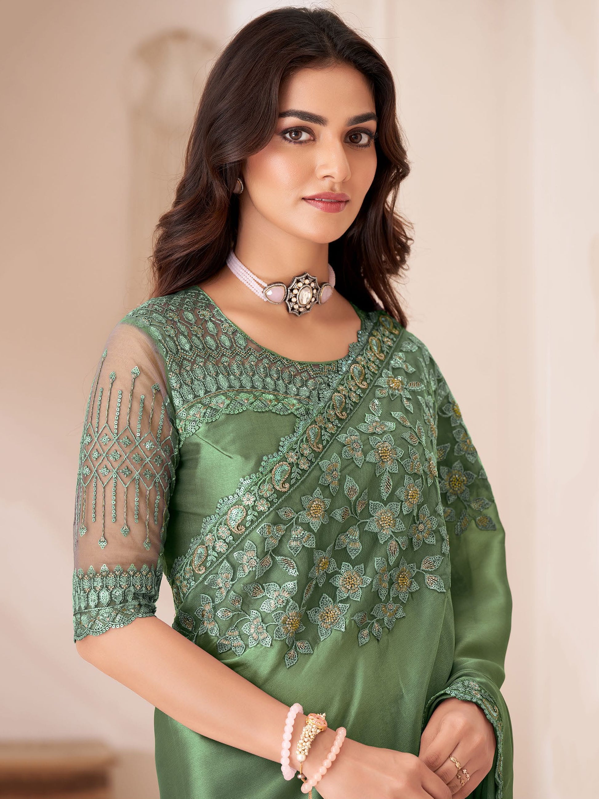 Alluring Dusty Green Heavy Border Work Georgette Event Wear Saree