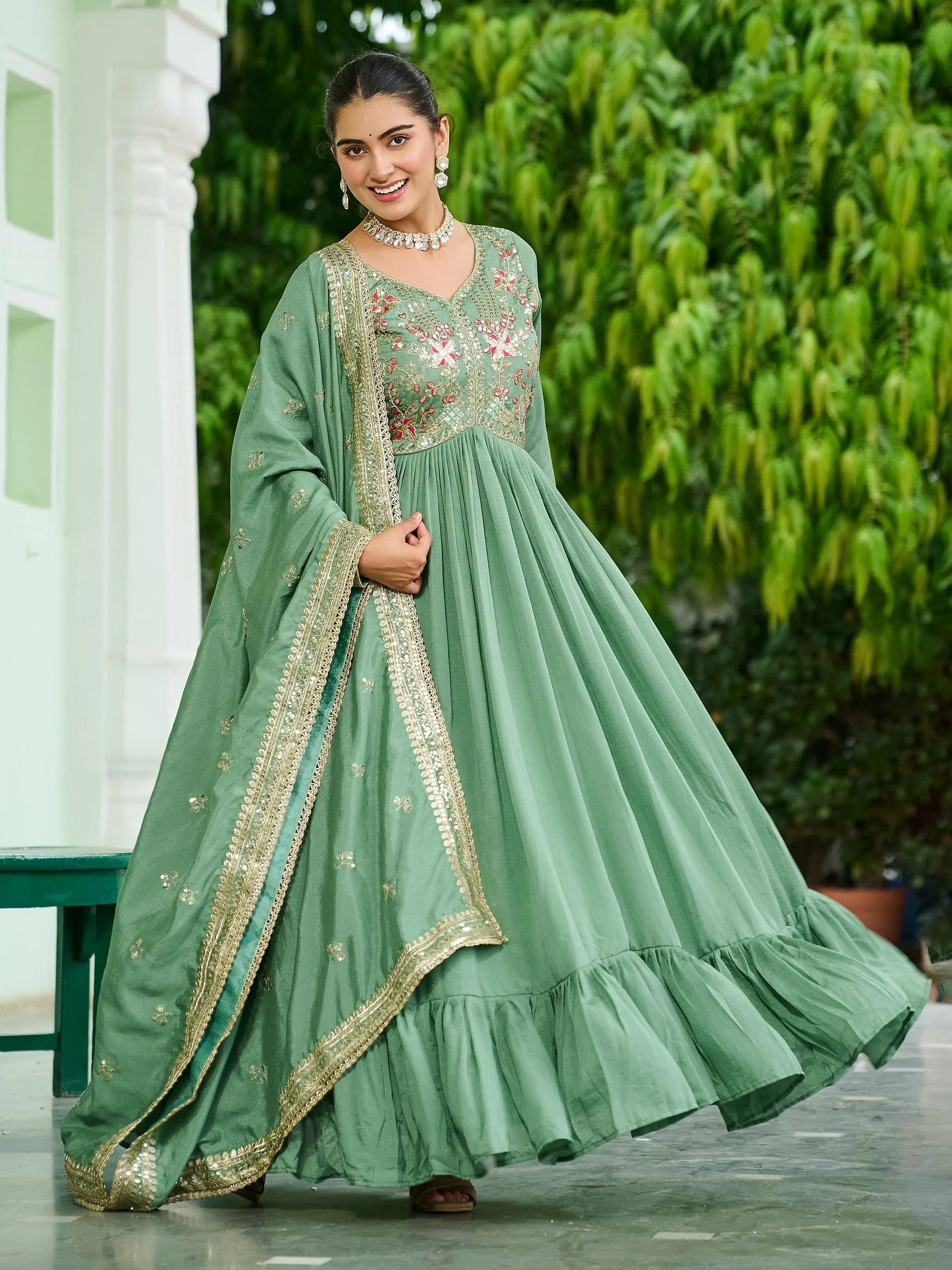 Sensational Pista Green Sequins Silk Mehendi Wear Gown With Dupatta
