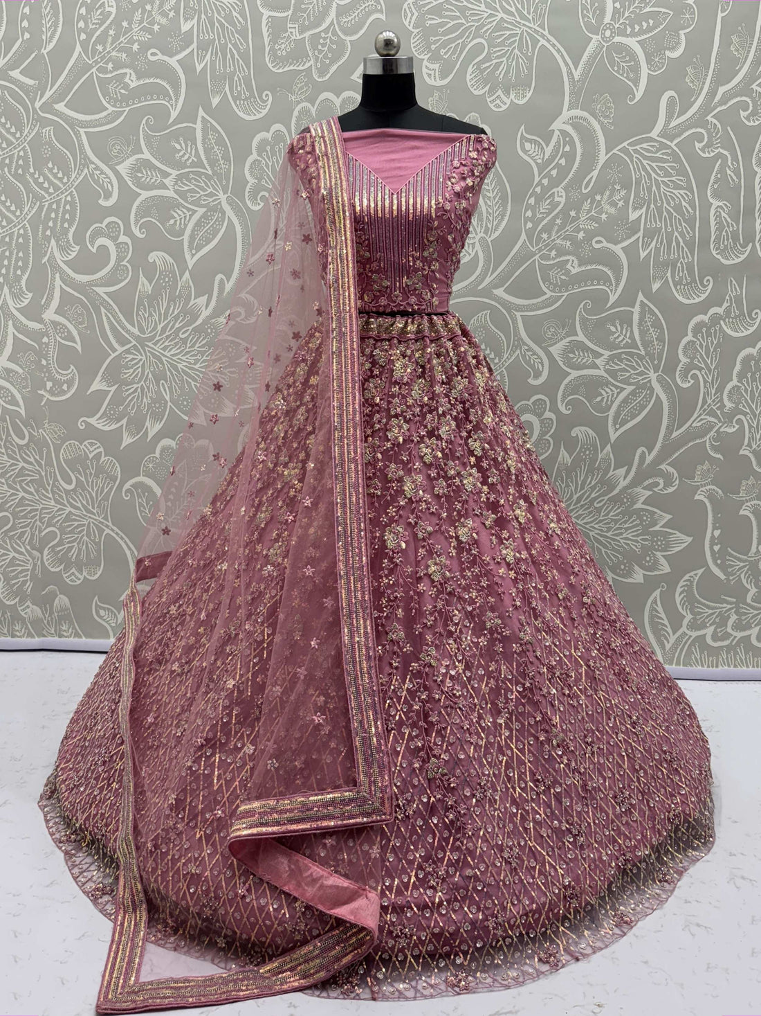 Shiny Pink Multi Thread Work Net Engagement Wear Lehenga With Blouse