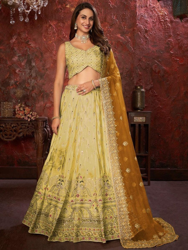 Fabulous Light Yellow Embroidered Crepe Haldi Wear Lehenga Choli