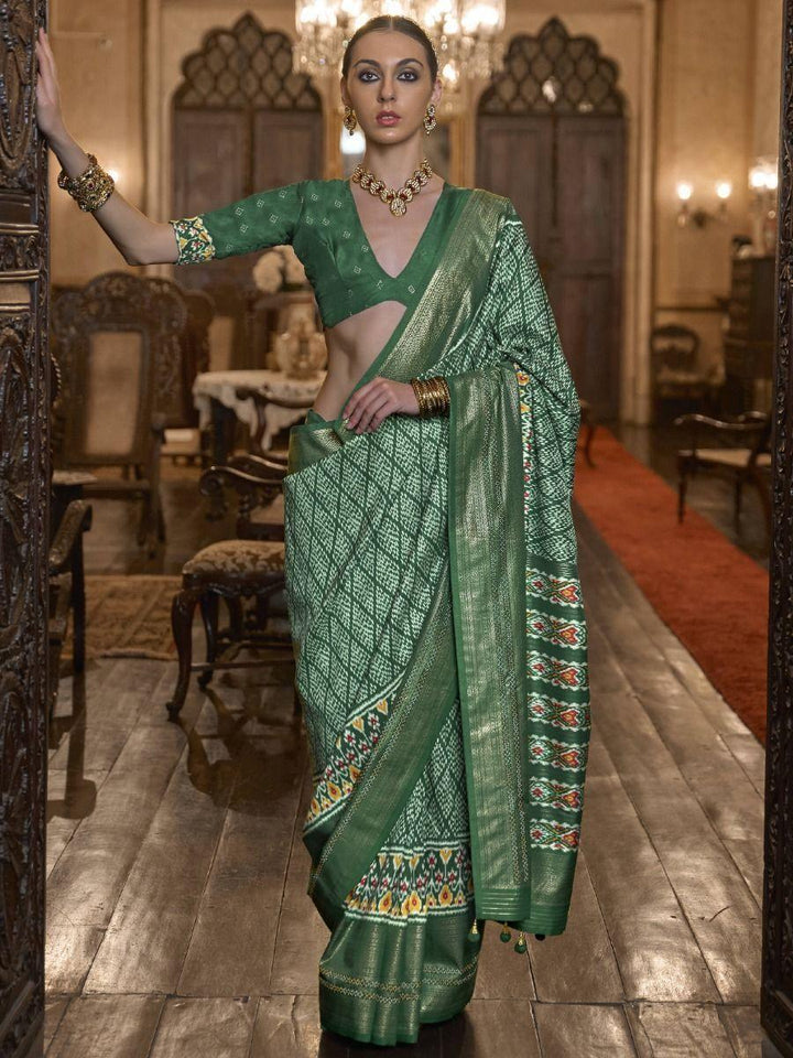 Traditionally Green Printed Patola Silk Wedding Wear Saree With Blouse