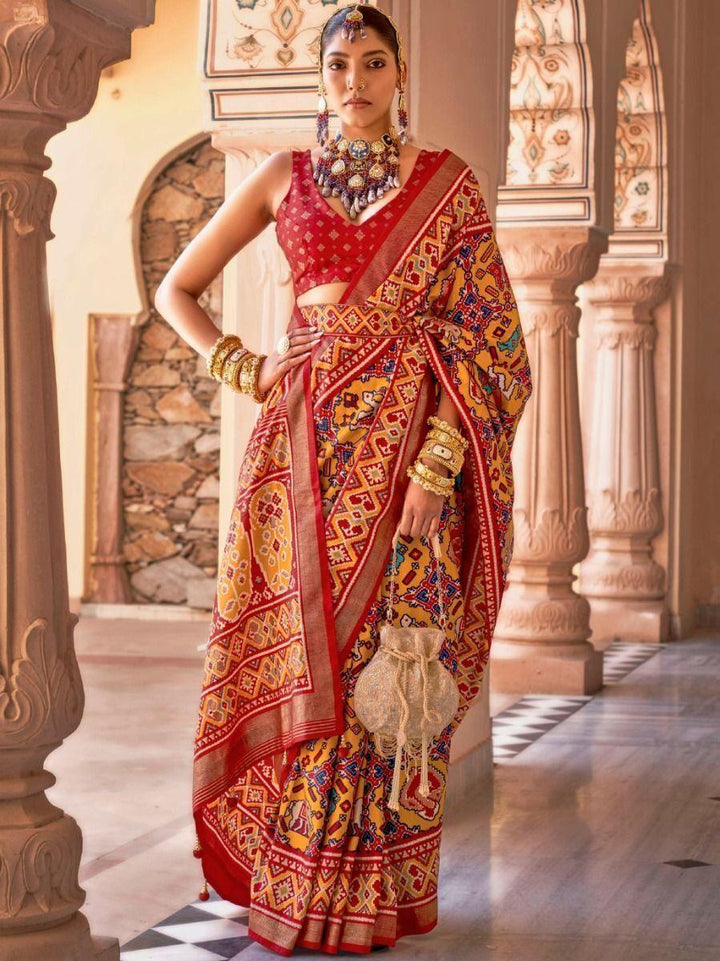 Mesmerizing Mustard Yellow Patola Printed Silk Wedding Saree