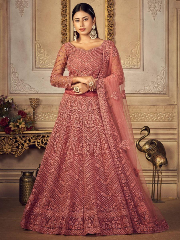 Enchanting Dusty Pink Embroidered Net Engagement Wear Lehenga Choli
