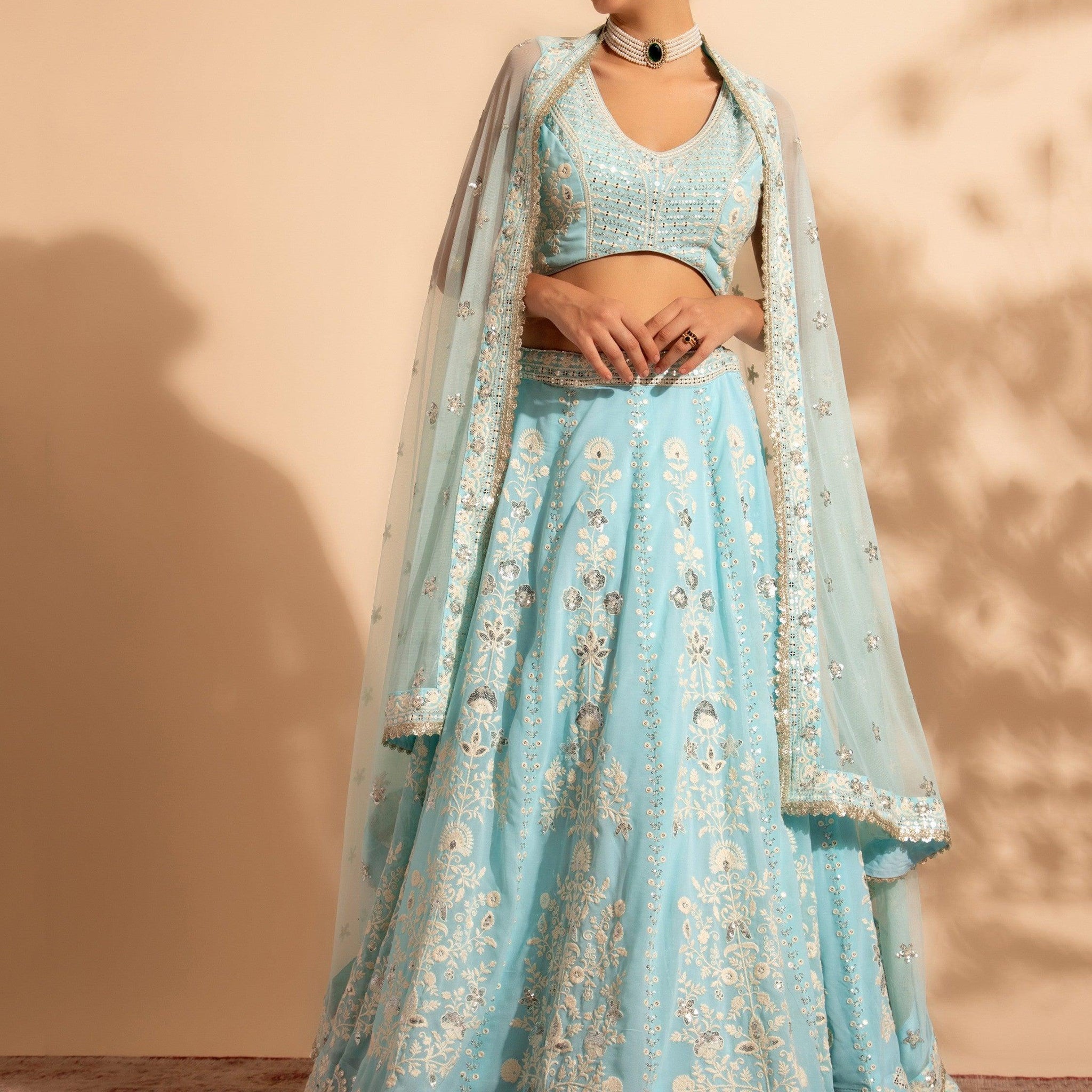Fascinating Sky Blue Thread Georgette Reception Wear Lehenga Choli