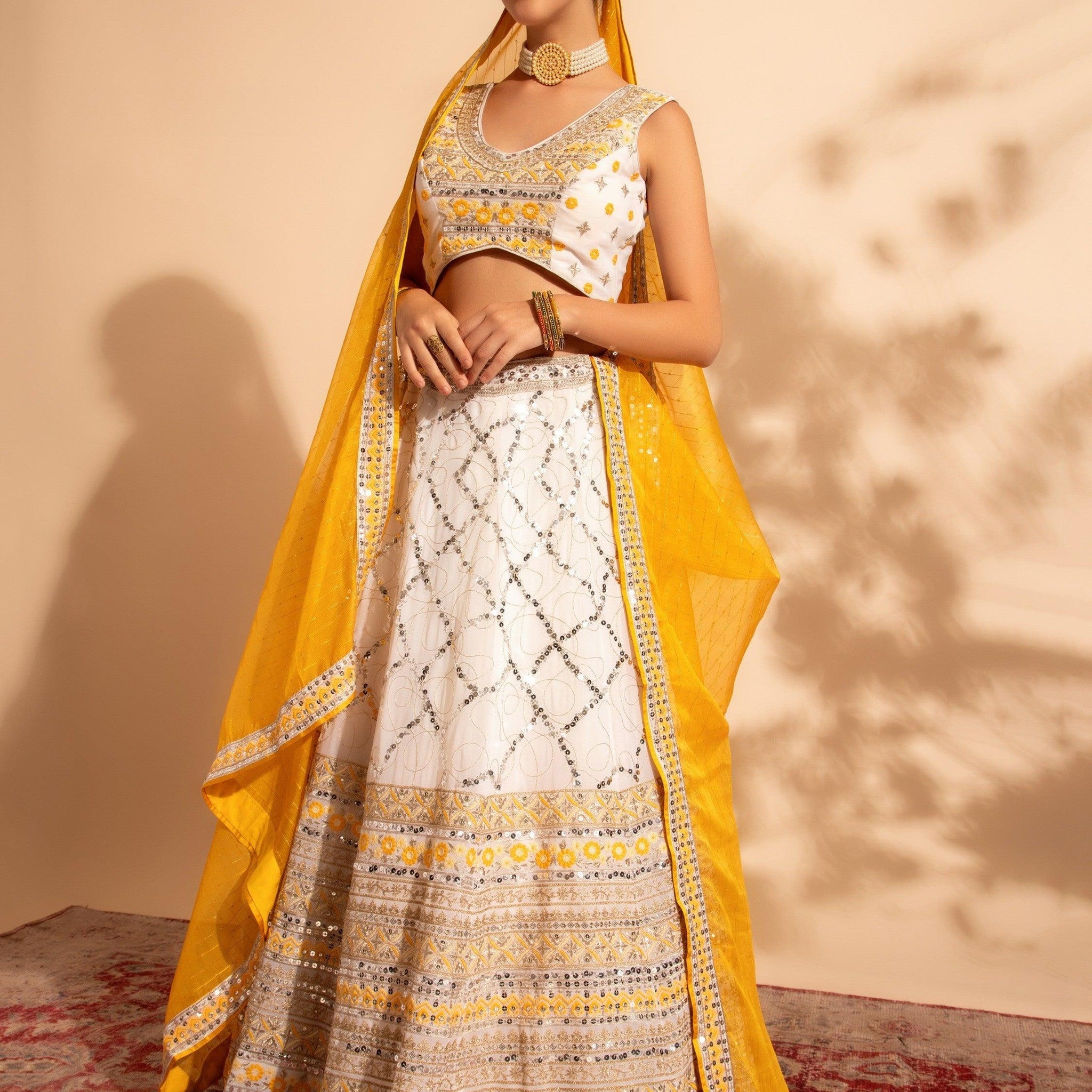 Bewitching White Sequins Work Georgette Function Wear Lehenga Choli
