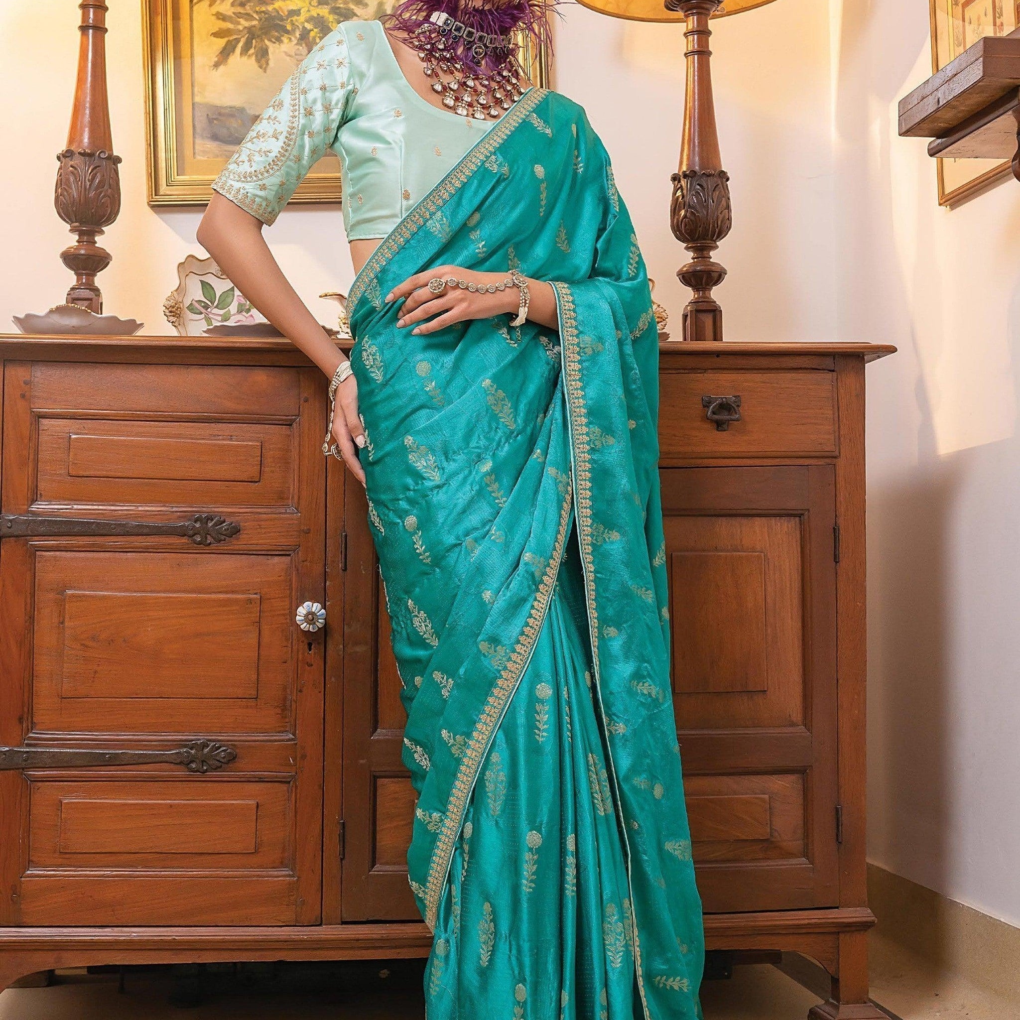 Incredible Teal Blue Zari Weaving Satin Traditional Saree With Blouse