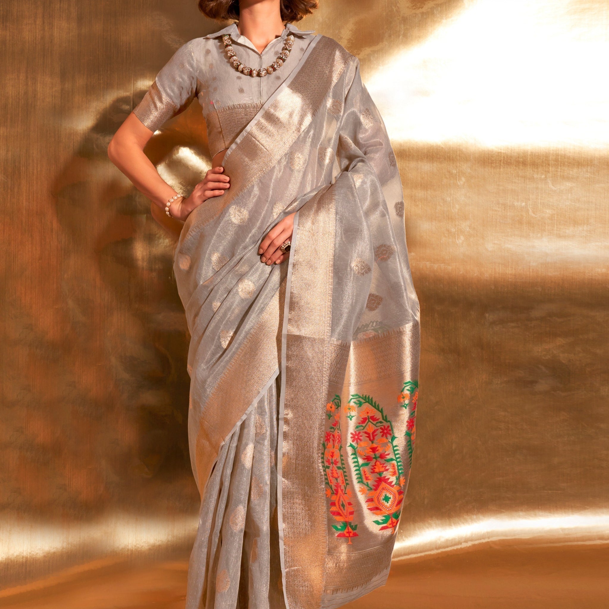 Fetching Grey Handwoven Tissue Silk Wedding Wear Saree