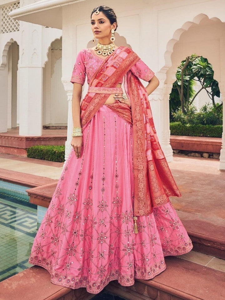 Astonishing Pink Embroidered Silk Wedding Wear Lehenga Choli