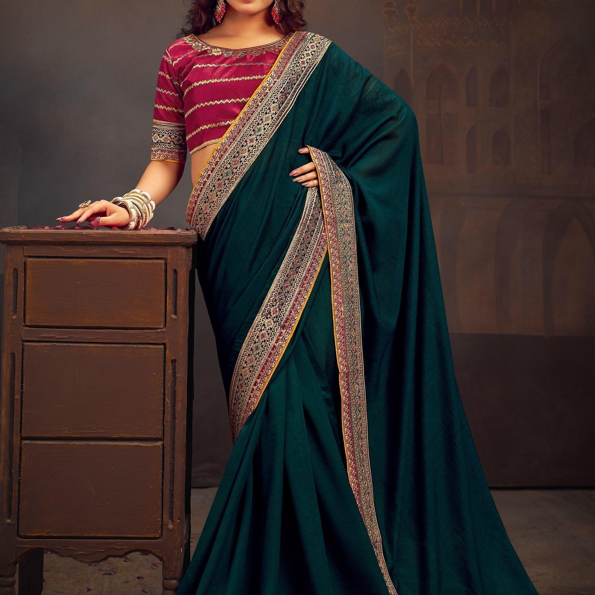 Superb Teal Blue Heavy Border Silk Engagement Wear Saree
