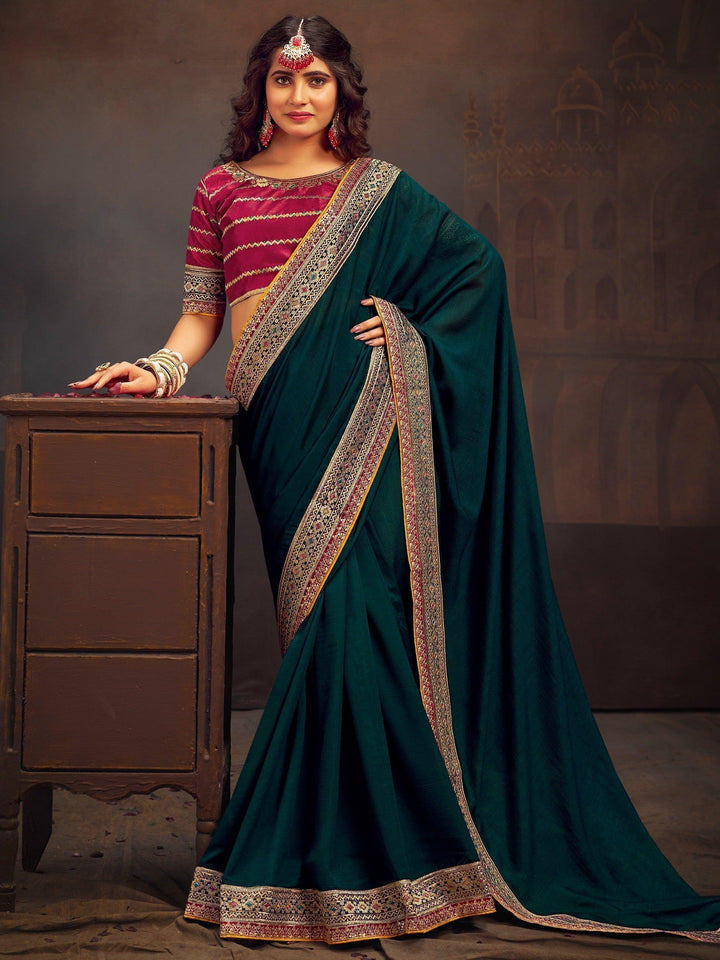 Superb Teal Blue Heavy Border Silk Engagement Wear Saree