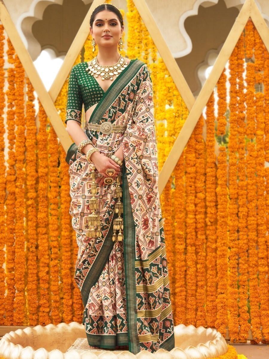 Amazing Cream & Green Patola Printed Silk Saree With Blouse