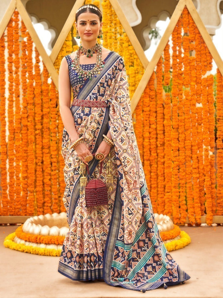 Amazing Cream & Blue Patola Printed Silk Traditional Saree