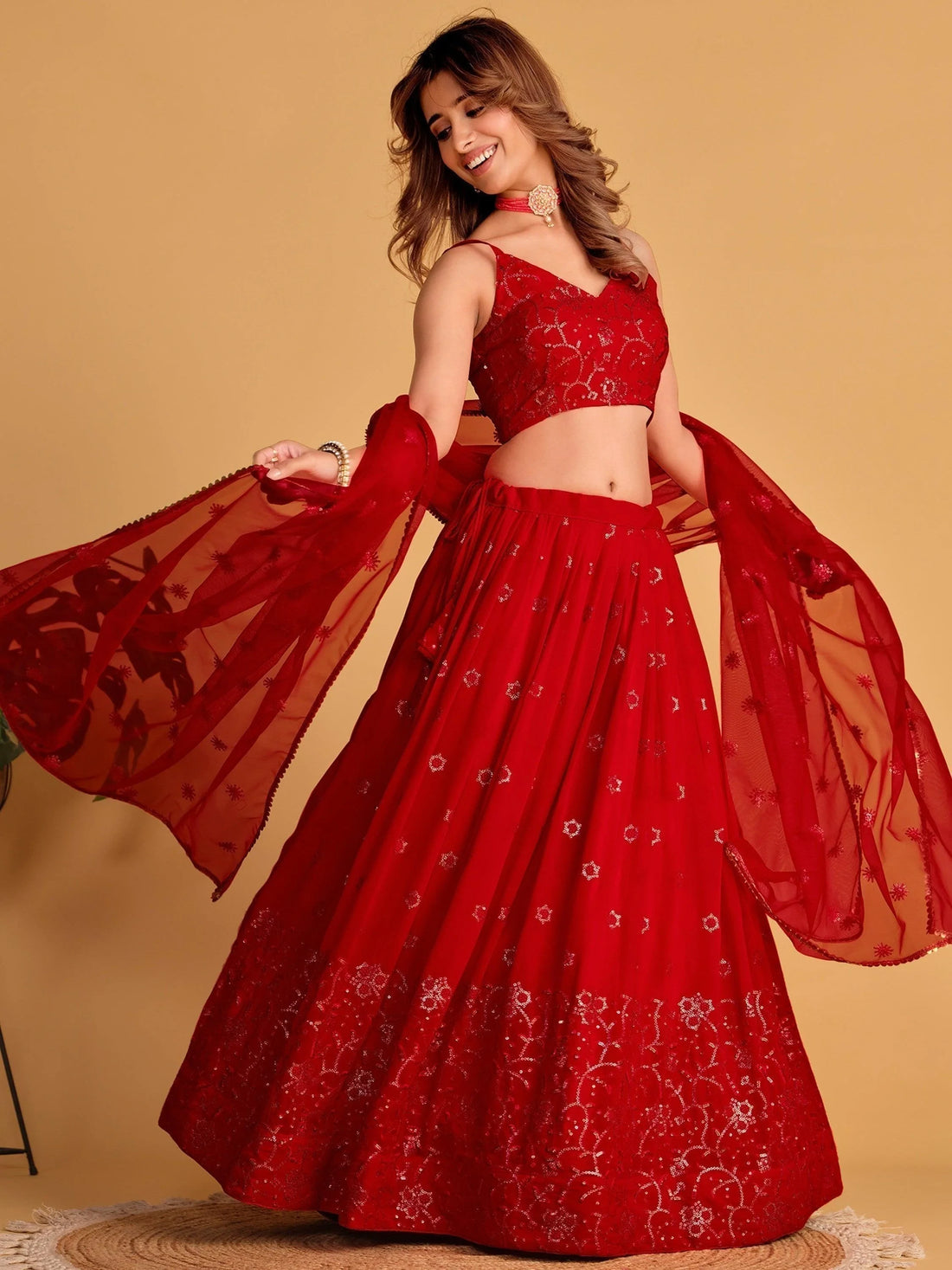 Spectacular Red Sequins Georgette Reception Wear Lehenga Choli