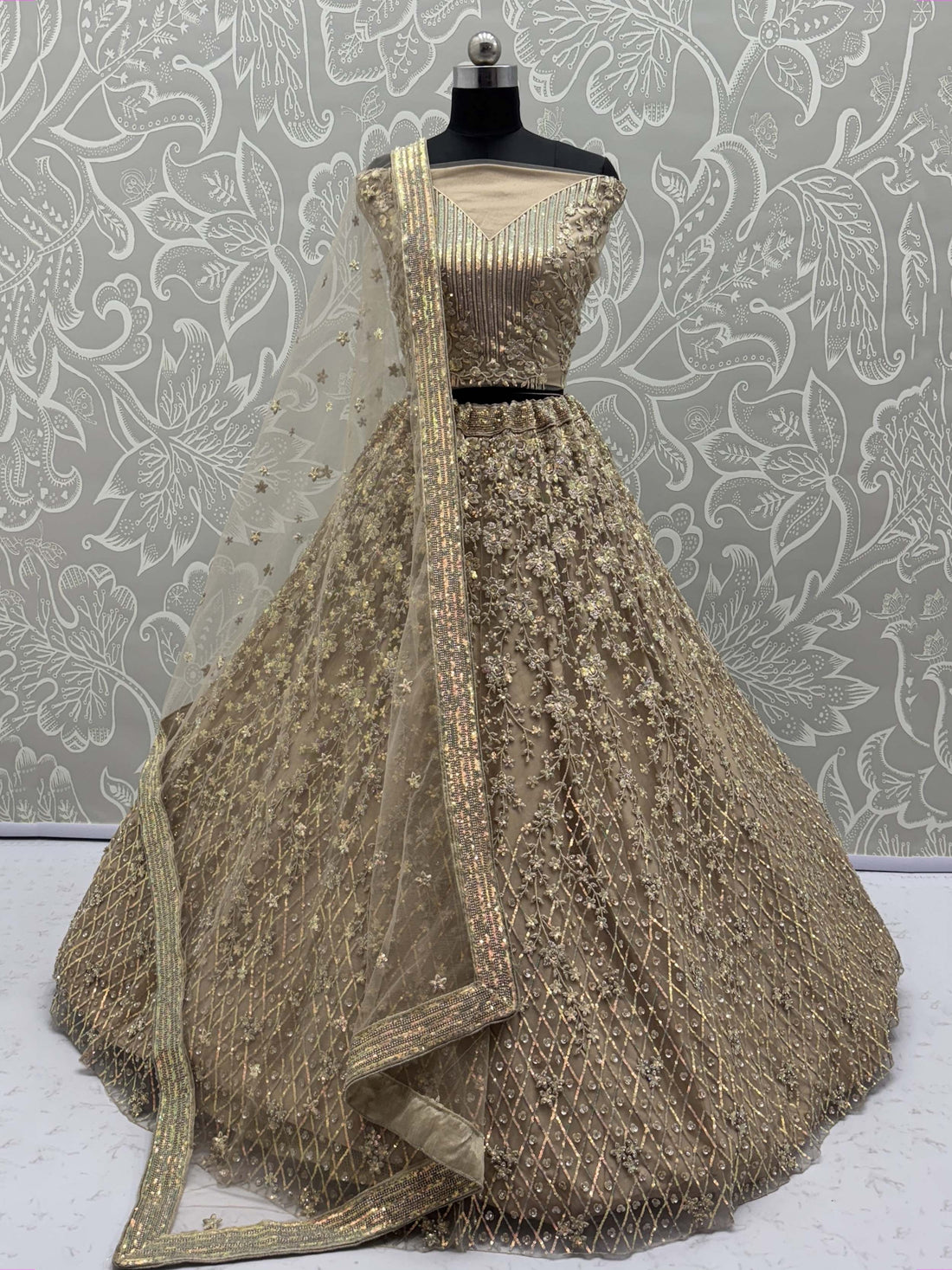 Stellar Beige Sequins Embroidered Net Lehenga Choli With Dupatta