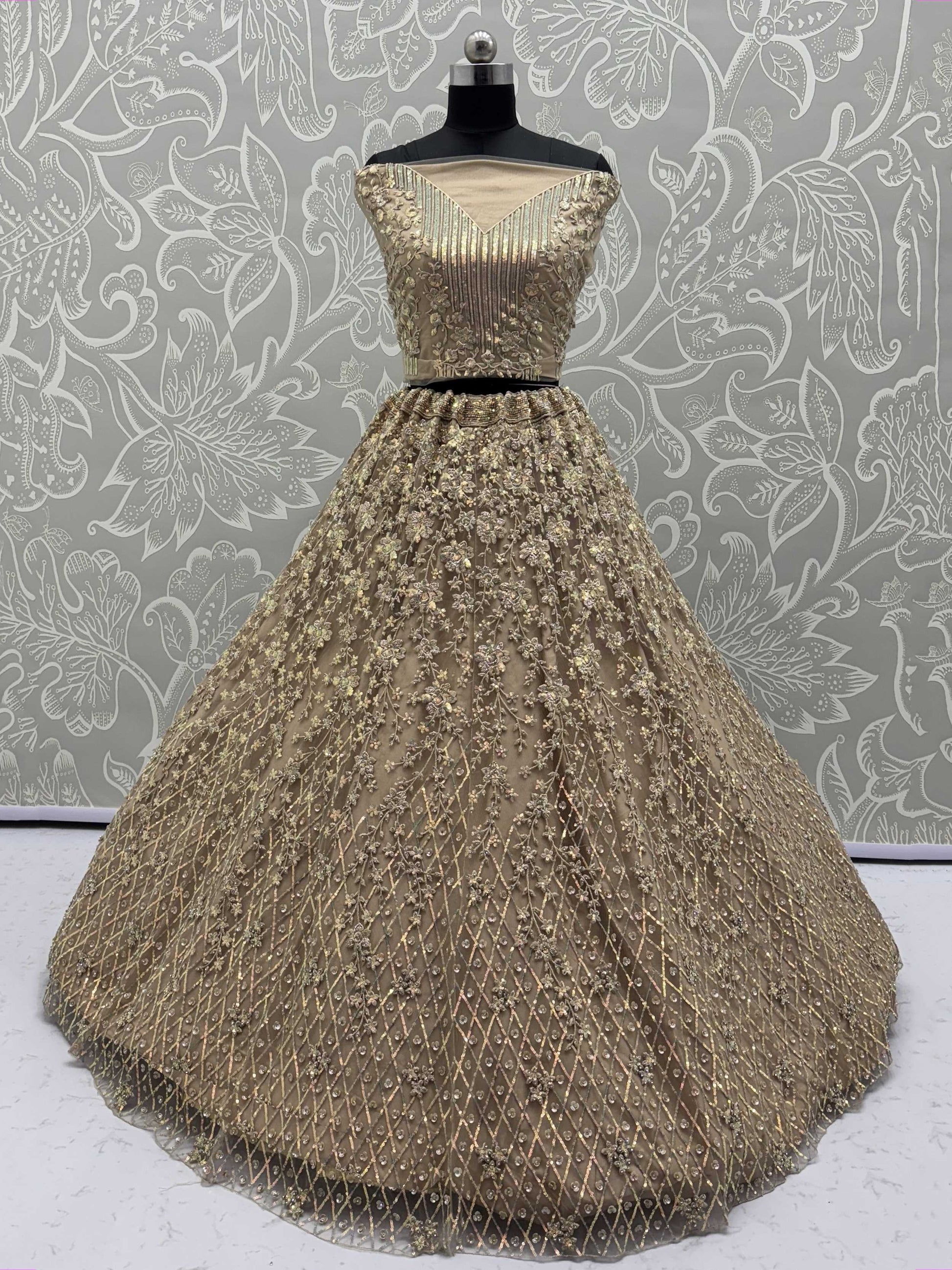 Stellar Beige Sequins Embroidered Net Lehenga Choli With Dupatta