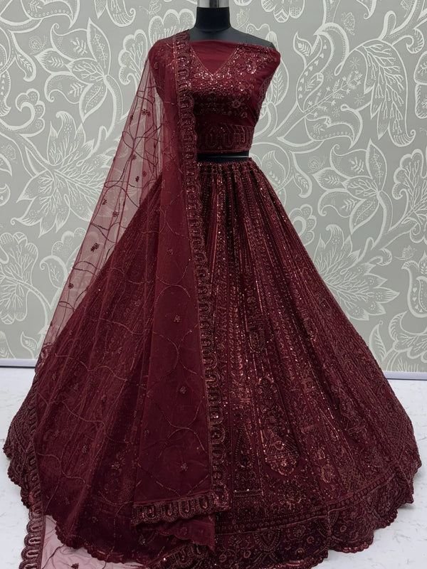 Stellar Maroon Thread Work Net Bridal Lehenga Choli With Dupatta