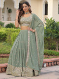 Striking Green Sequins Embroidered Georgette Festive Wear Lehenga Choli With Dupatta