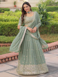 Striking Green Sequins Embroidered Georgette Festive Wear Lehenga Choli With Dupatta