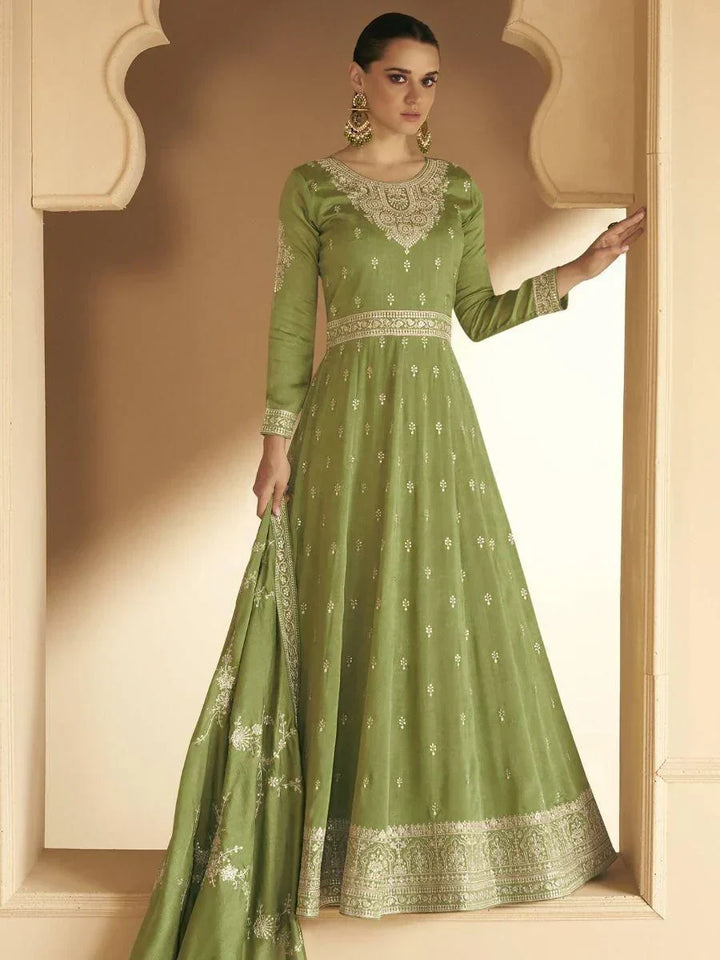 Stunning Green Embroidered Silk Wedding Wear Gown With Dupatta