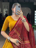 Stunning Mustard Yellow Bandhej Print Tussar Silk Lehenga Choli With Dupatta - Zeel Clothing