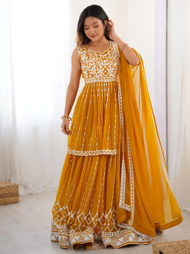 Stunning Mustard Yellow Sequins Georgette Peplum Top With Lehenga - Zeel Clothing