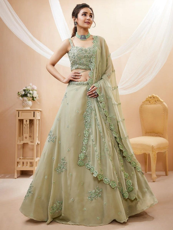 Stunning Pista Green Embroidered Sangeet Wear Lehenga Choli