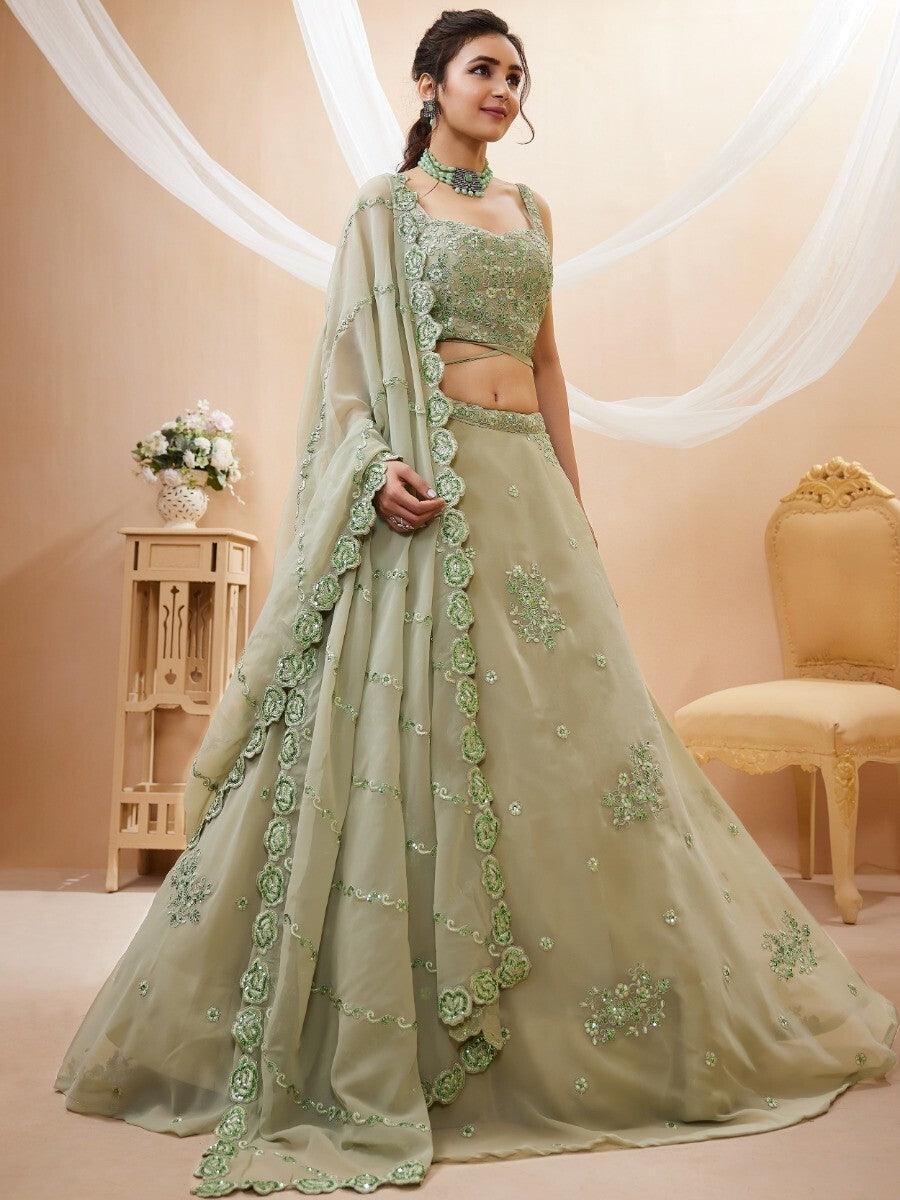 Stunning Pista Green Embroidered Sangeet Wear Lehenga Choli