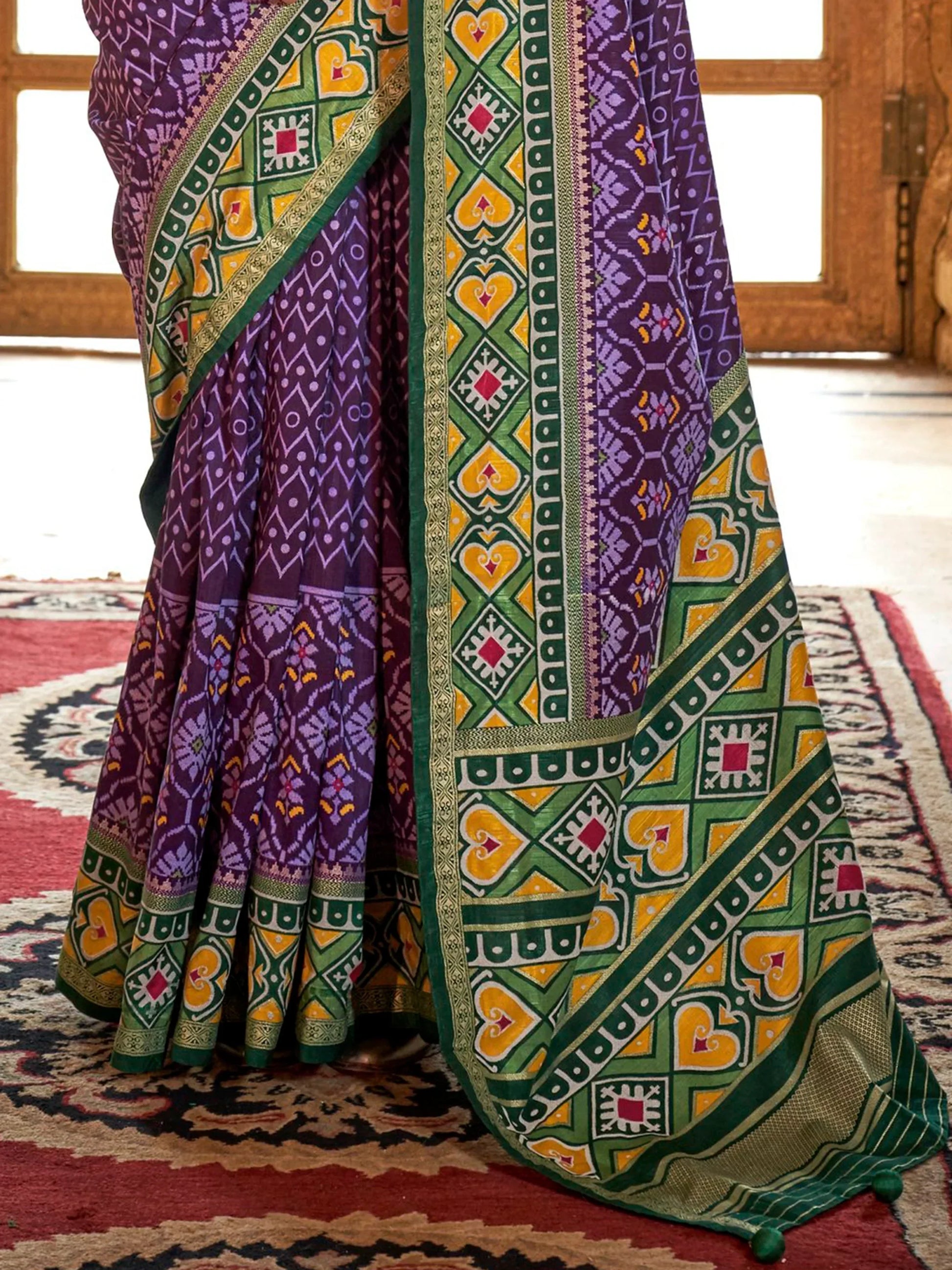 Stunning Purple Patola Printed Silk Casual Wear Saree With Blouse - Zeel Clothing