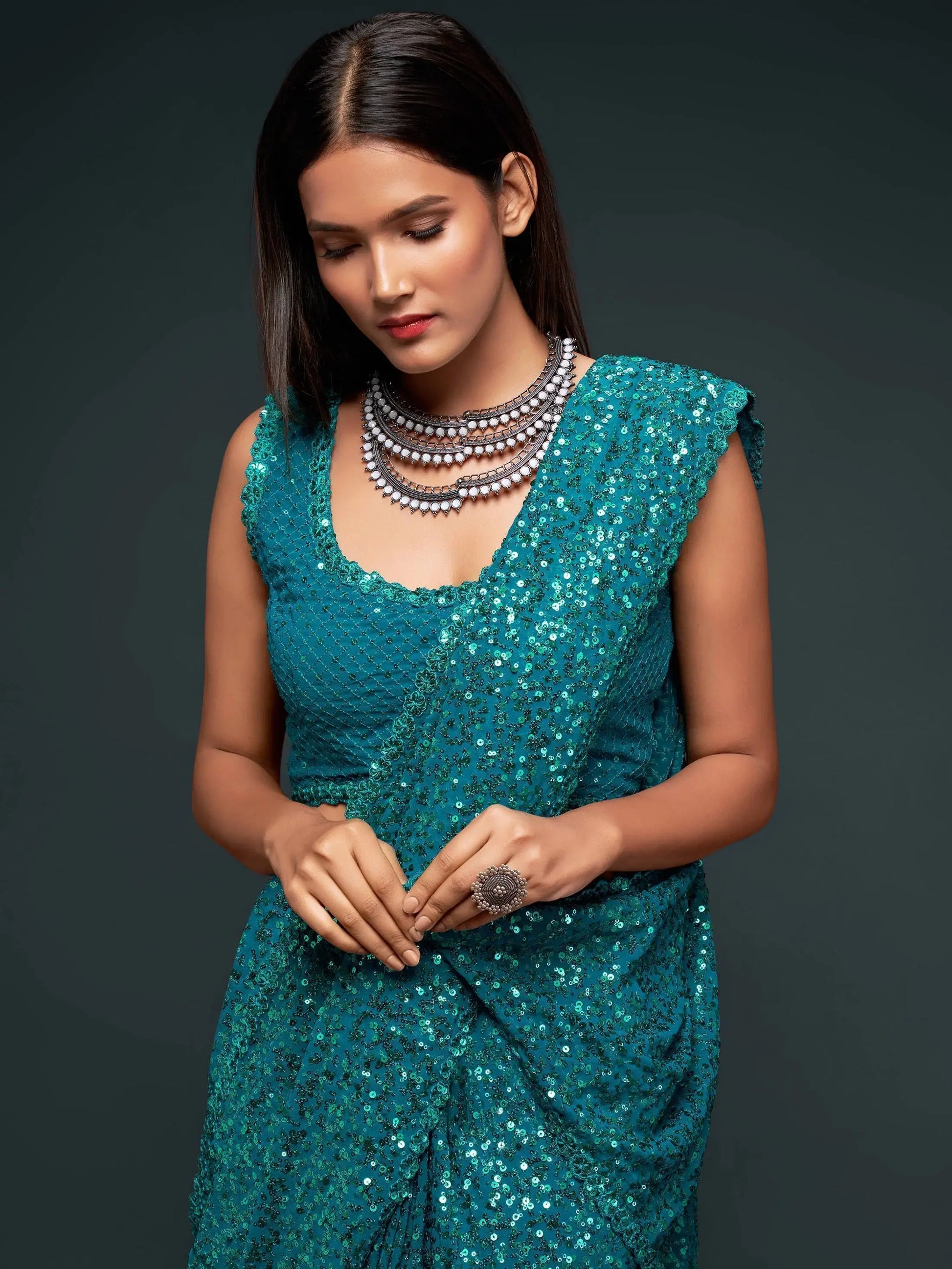 Stunning Teal Blue Sequins Georgette Reception Wear Saree - Zeel Clothing