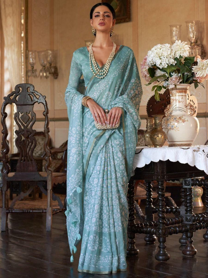 Stunning Turquoise Floral Printed Cotton Festival Wear Saree