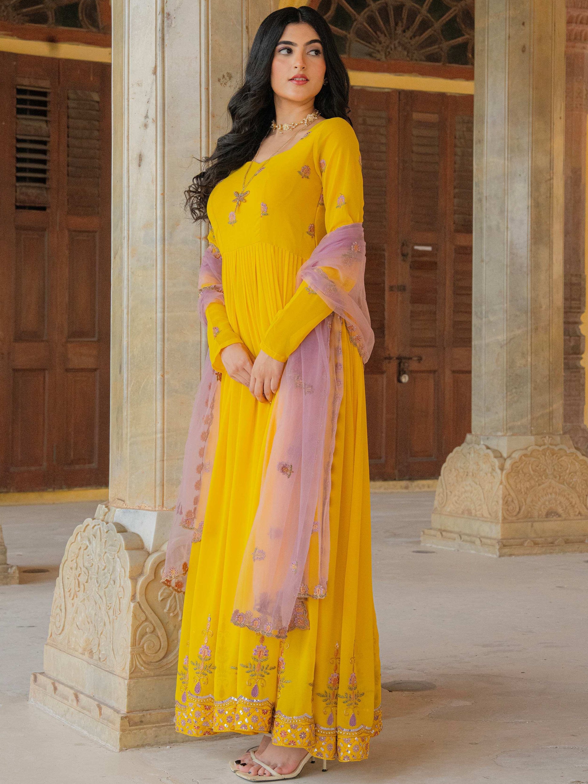 Stunning Yellow Sequins Work Georgette Festive Wear Gown With Dupatta