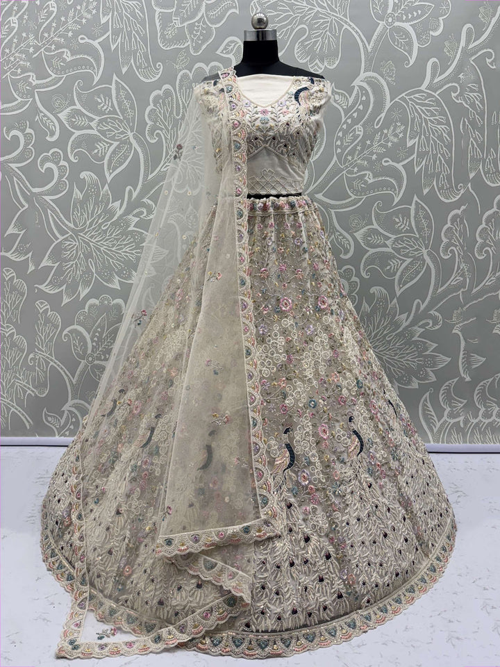 Stupendous White Thread Work Net Reception Wear Lehenga Choli With Dupatta