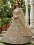 Stylish Golden Zari Embroidery Net Reception Wear Lehenga Choli With Dupatta