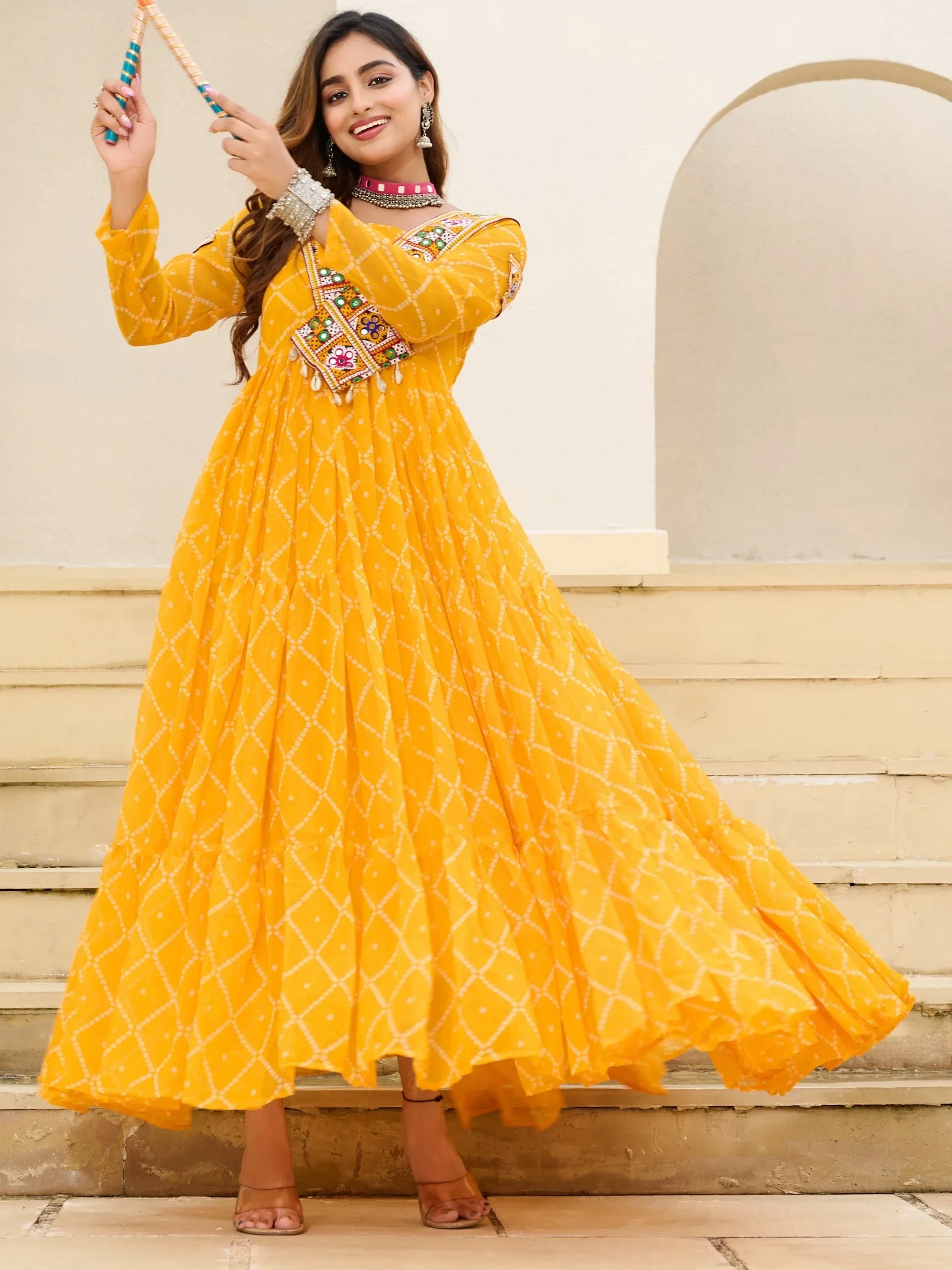 Sumptuous Yellow Kutchi Patch Work Georgette Navratri Wear Gown - Zeel Clothing
