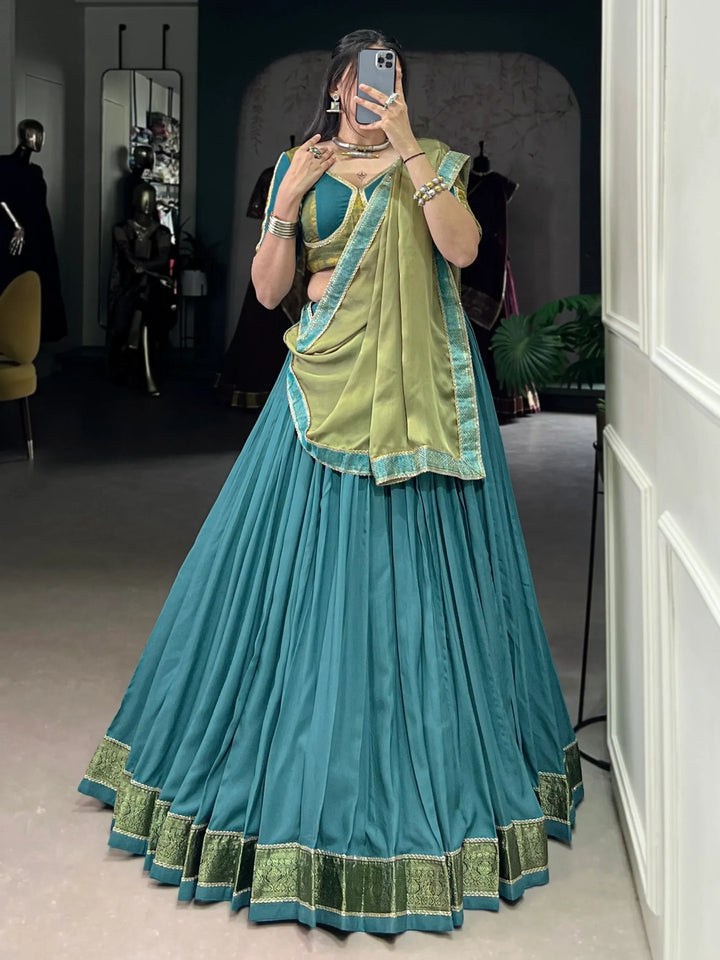 Superb Teal Blue Zari Weaving Rayon Festive Wear Lehenga Choli With Dupatta - Zeel Clothing