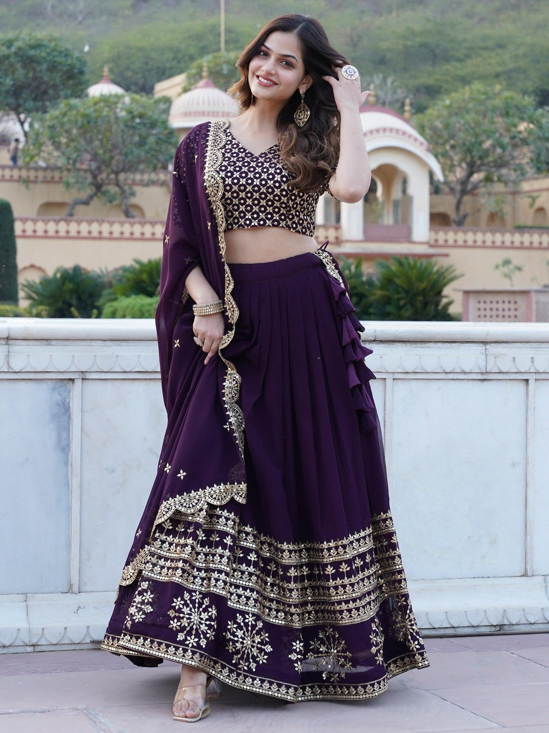 Surprising Purple Sequins Georgette Wedding Wear Lehenga Choli