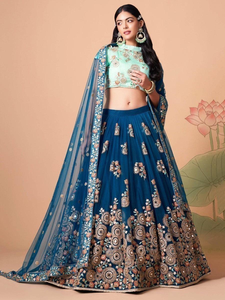 Spectacular Dove Blue Mirror Work Net Event Wear Lehenga Choli