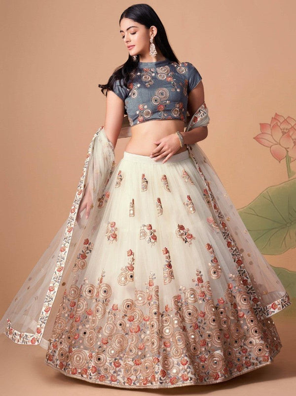 Fascinating Off-White Mirror Work Net Party Wear Lehenga Choli