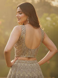 Tremendous Golden Dori Embroidered Net Cocktail Wear Lehenga Choli With Dupatta