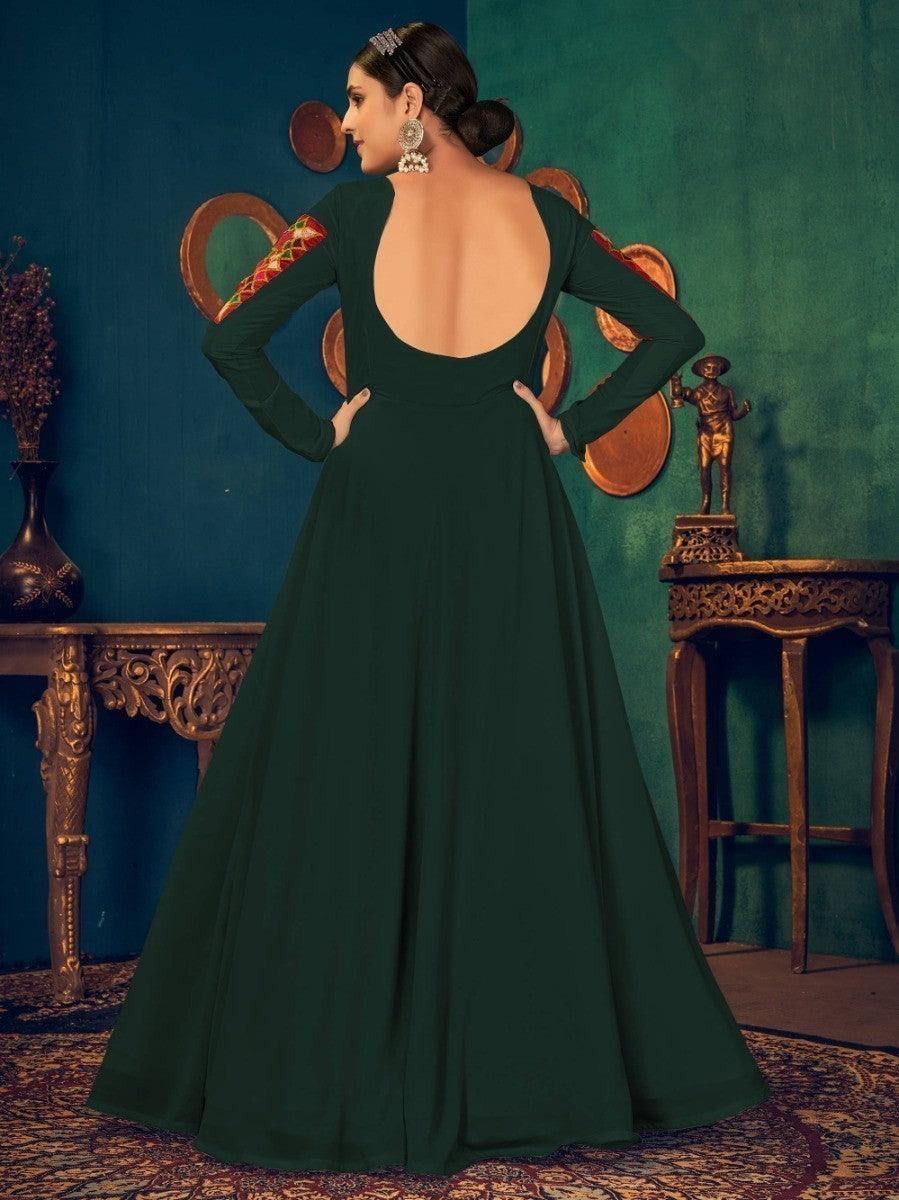 Emerald green long-sleeve gown with open back and embroidered sleeves, elegant women's fashion