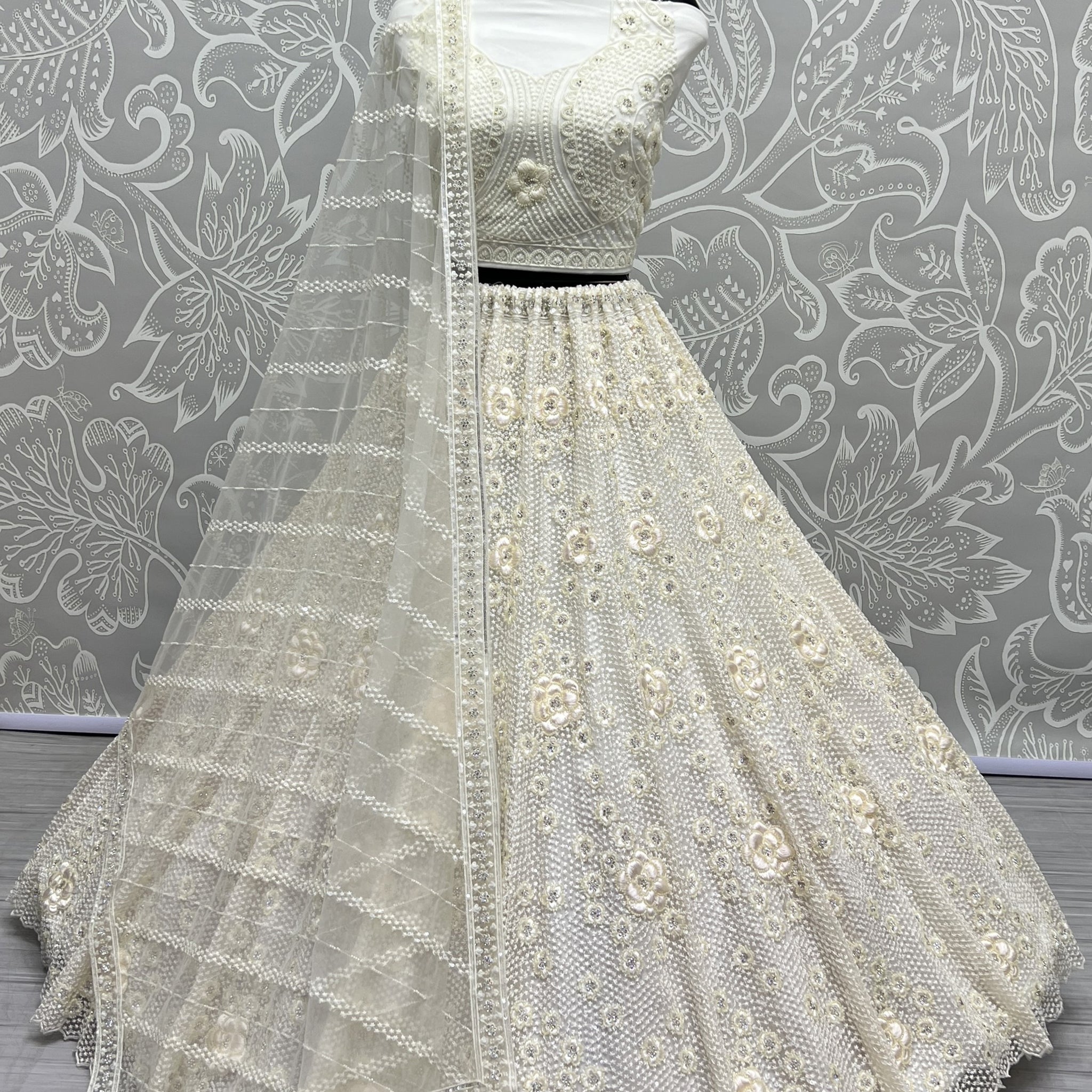 Beautiful White Thread Work Net Designer Lehenga Choli With Dupatta