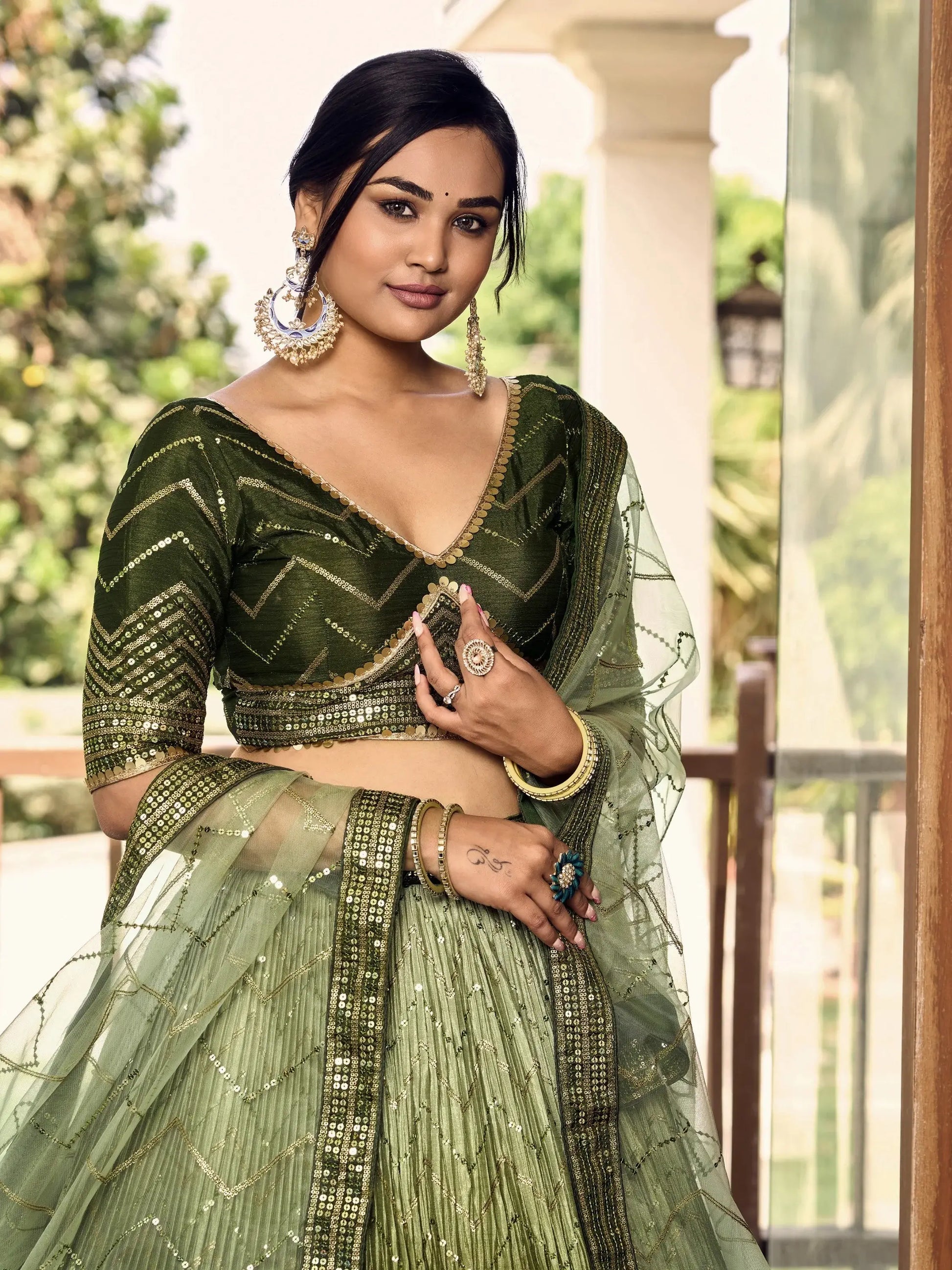 Wonderful Green Sequins Chinon Mehendi Wear Lehenga Choli - Zeel Clothing
